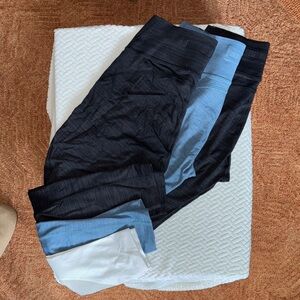 3 Outdoor Voices Leggings in Black, Blue, and Black/White